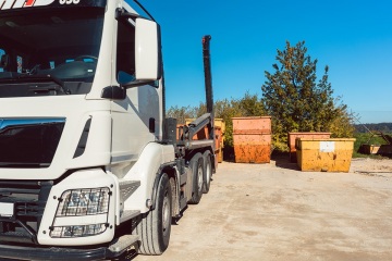 Demolition debris container waiting to be loaded on truck