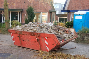 Loaded garbage dumpster